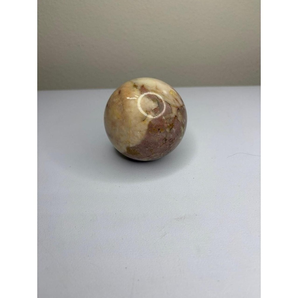 polished sphere made of polychrome jasper